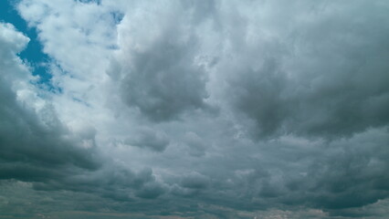 Obraz premium Heavy Rain Before A Storm. Weather For Good Rainy Season. Ominous Clouds Slowly Drift Across Sky.