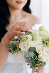 bride holding wedding bouquet