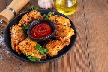 Grilled roasted spicy chicken thigh with ketchup
