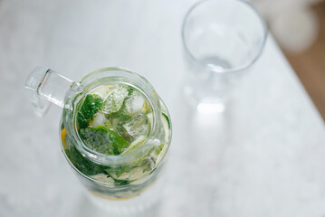 diet water. Cucumber, lemon, mint lemonade in glasses
