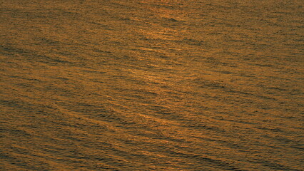 Sea And Sun In An Abstract Landscape. Texture Of Glitter Water And Soft Waves. Real time.