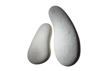 Pair of smooth sea stones or Pebbles. Two smooth gray sea pebble with shadow isolated on white...