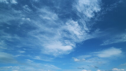 White cirrus clouds and blue colors sky. Weather was very hot in the evening. Tropical summer...