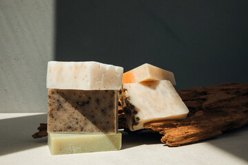 Handmade soap from natural ingredients, various herbs. Concept of sustainable use, bath products. Front view
