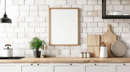 Modern kitchen interior with a blank frame, cooking utensils, and plant decoration on a wooden countertop against a white brick wall.