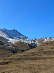 Georgia, Kazbegi region. View of the green peaks of the mountains 