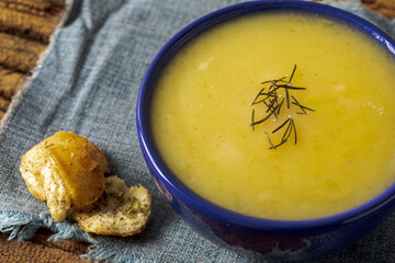 Delicious cassava cream (Caldo ou Creme de Mandioca) or cassava soup, typical of Brazilian cuisine,...