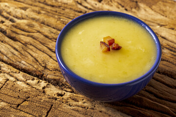 Delicious cassava cream (Caldo ou Creme de Mandioca) or cassava soup, typical of Brazilian cuisine,...