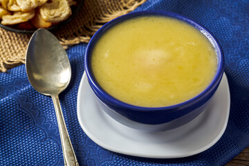 Delicious cassava cream (Caldo ou Creme de Mandioca) or cassava soup, typical of Brazilian cuisine,...