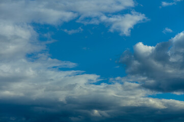 Obraz premium Beautiful scenic gradient sky between hot and cool tone of twilight sky with a cloud.