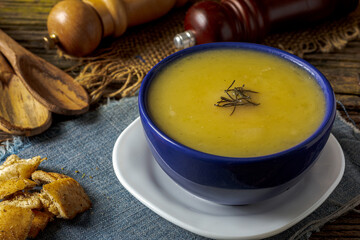 Delicious cassava cream (Caldo ou Creme de Mandioca) or cassava soup, typical of Brazilian cuisine,...