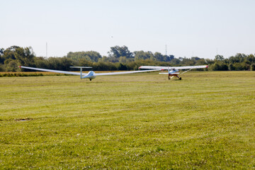 Fototapeta premium airplane and glider taking off