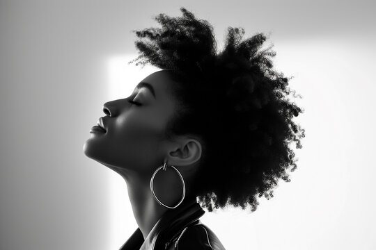 Profile of a serene young Black woman with eyes closed. Generative AI image