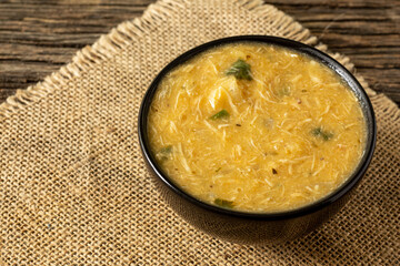 Caldo de Kenga Cassava broth with shredded chicken, typical Brazilian food known as (Caldo de...