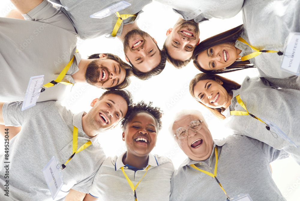 Wall mural portrait of a volunteer team in a circle, embodying commitment to charity, community service, and he