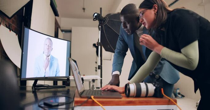 Photographer, team and production on laptop in studio editing photoshoot pictures, digital art or project process. Woman, man editor and backstage on screen with photography catalog for magazine