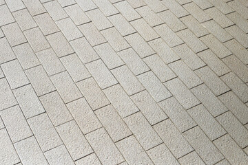 Brown tile floor walkway.Tiled courtyard