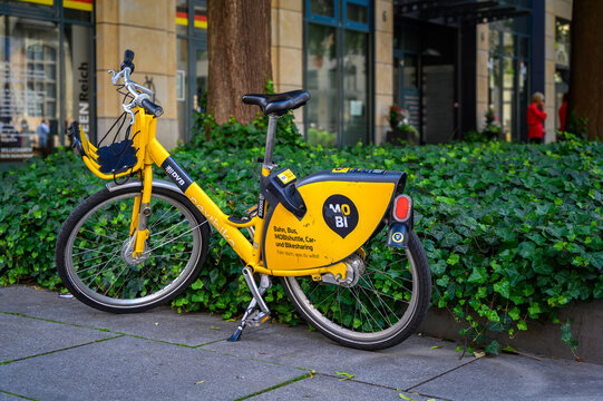 Dresden, Germany - June 8, 2024: Parked rentable bike in downtown Dresden, Germany.