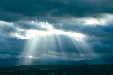 God's Power In The Sunlight Through The Clouds