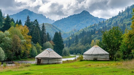 Two yurts in the grassland with green trees and rivers on their sides, featuring traditional Kazakh yurt decoration and colorful patterns on the white canvas cover, surrounded by a dense forest.
