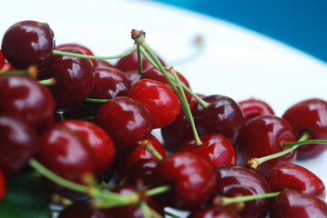 Cherries on a plate, close-up, toned