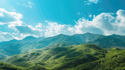 Fototapeta premium Green Mountains under the Blue Sky