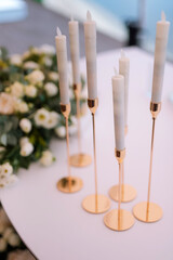 atmospheric candle decor with live fire on the banquet table