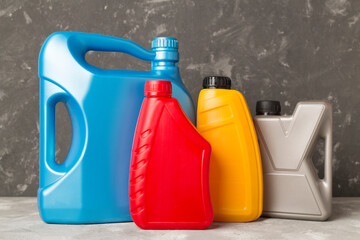 Different automobile products on concrete background