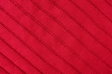 Closeup view of red knitted texture as background