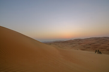 Sunset in the desert of Abu Dhabi in Emirates