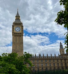 big ben, The iconic Big Ben clock tower with the Houses of Parliament in the background under a...
