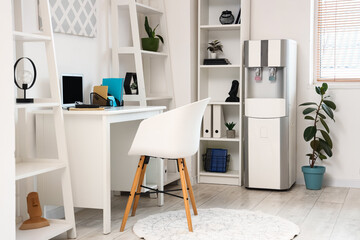 Interior of office with modern water cooler