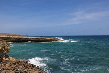Scenic view of the rocky Caribbean Sea coastline on the island of Aruba.