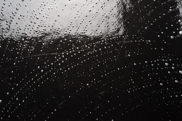 Traces of foam. Wet soap foam with bubbles. Foam on a dark