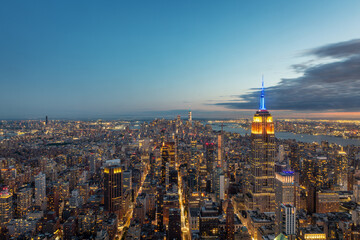 Aerial view of the Empire State Building and downtown Manhattan at dusk, New York City. 