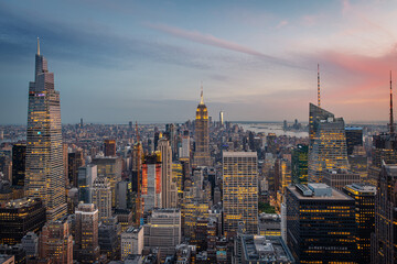 Aerial view of the Empire State Building and downtown Manhattan at dusk, New York City. 