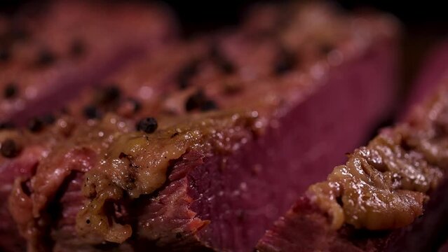 Juicy Corned Beef Cuts with Pepper on Top are a gourmet delight for culinary enthusiasts