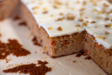 Vegan carrot cake with walnotes in pieces
