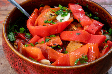Grilled red peppers, sweet paprika salade with fresh garlic and parsley