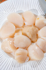 Atlantic bay cleaned scallops coquille St. James sea shells, catch of the day in Normandy or Brittany, France