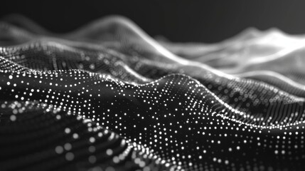 An abstract image featuring a monochrome digital landscape of undulating waves formed by particles