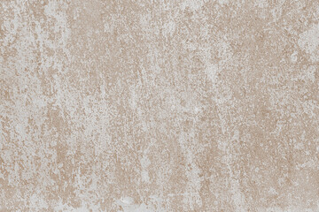 White and brown colored messy stucco, plaster texture background close up. Decorative weathered painted wall, aged stained concrete surface. Wallpaper, backdrop, copy space