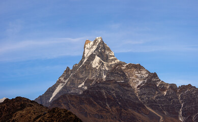 Machapuchare, Fishtail Mountain. Annapurna massif of Gandaki Province, north-central Nepal. View from Mardi Himal Trek, Annapurna Sanctuary. Teahouse Trek Hiking Destination, Himalayan Mountain Range.