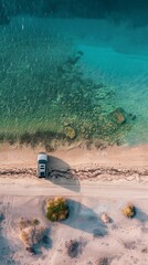 Tranquil Bay: Aerial View of Car Parked on Sandy Shore with Calm Waters in Background