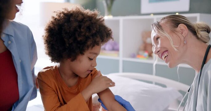Doctor, child and patient with smile for injection or vaccination for support and trust. Parent, pediatrician and kid with happiness for healthcare, treatment and care for immune system in hospital