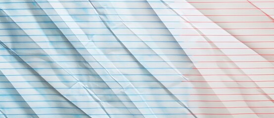 Obraz premium Crumpled blue and red lined paper creating abstract background texture, versatile for various projects. Ideal for office or artistic themes, visually appealing and dynamic backdrop