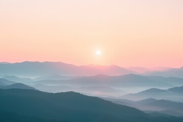 Fototapeta premium sunrise over a misty mountain