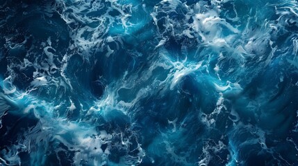Fototapeta premium An overhead shot capturing the intricate textures of rolling ocean waves, showcasing a blend of white foam on deep blue water