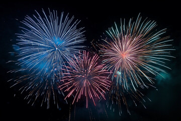 Colorful fireworks soaring over a black background. Can be used as abstract background or wallpaper
