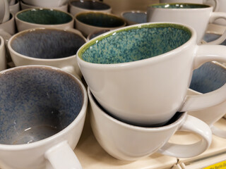 Stacked Ceramic Coffee Mugs with Textured Interiors